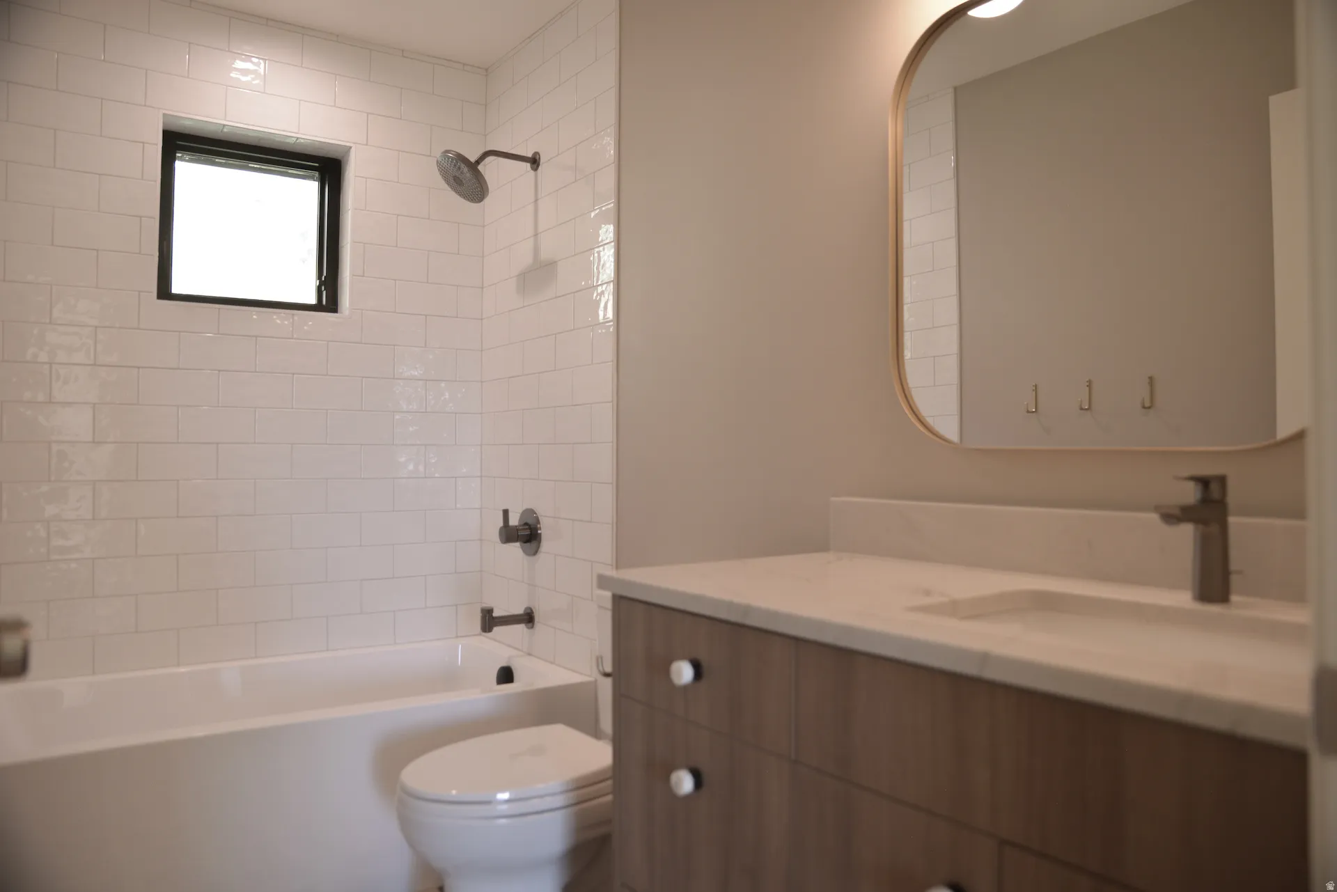 Full bathroom with vanity and tub / shower combination