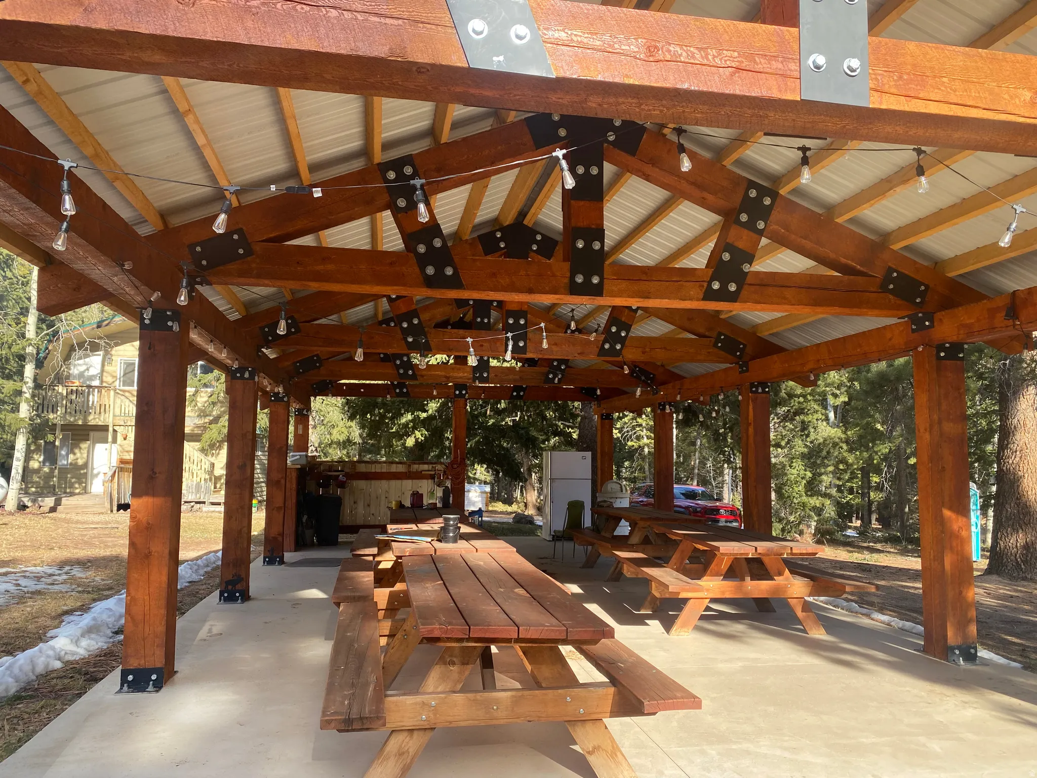 View of community featuring a patio area and outdoor dining area