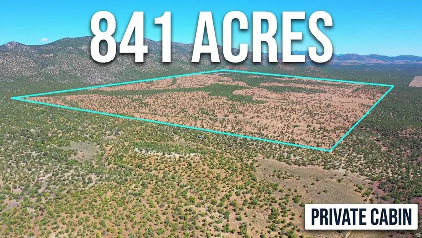 Property Listing Image. Aerial overview of an 841-acre land parcel, featuring a highlighted boundary and indicating a private cabin on the property