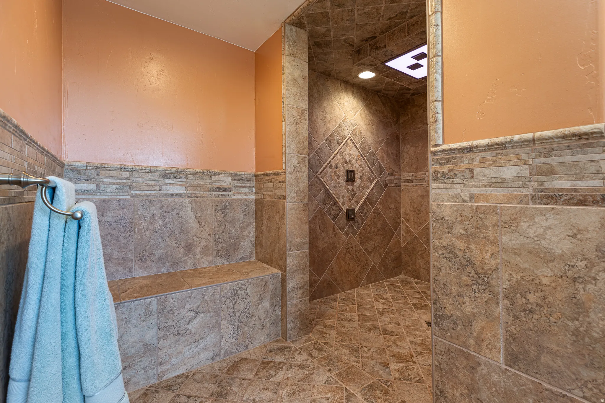 Bench seating into primary shower