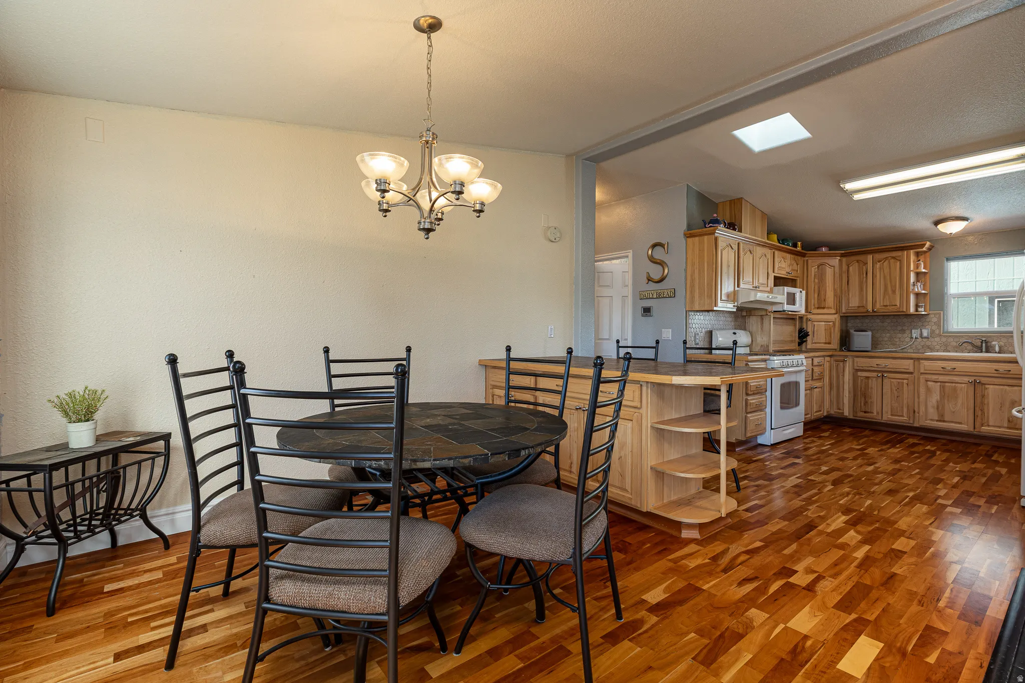 Dining area with vaulted ceiling
