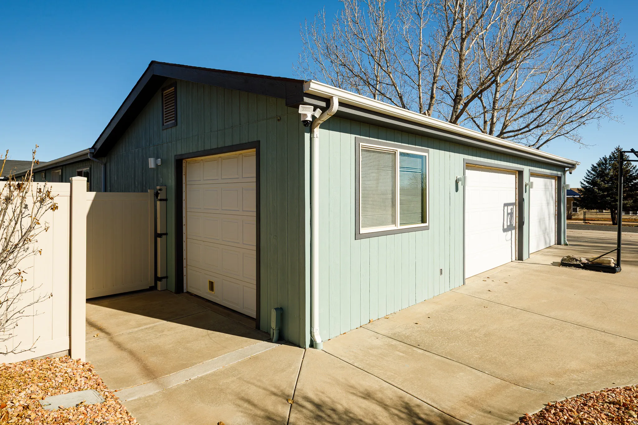 View of detached 3-car garage