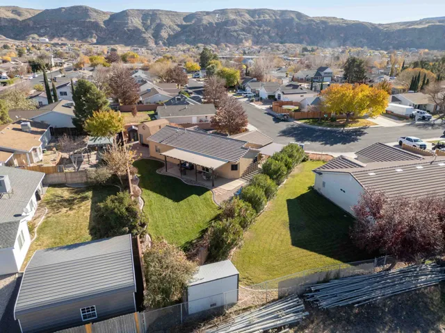 Aerial view of residential area with a mountainous background