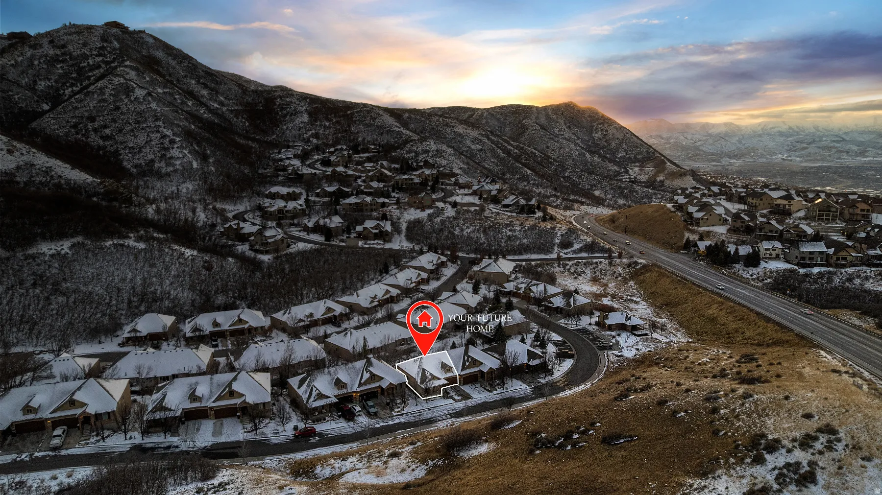 Snowy aerial view featuring a mountain view