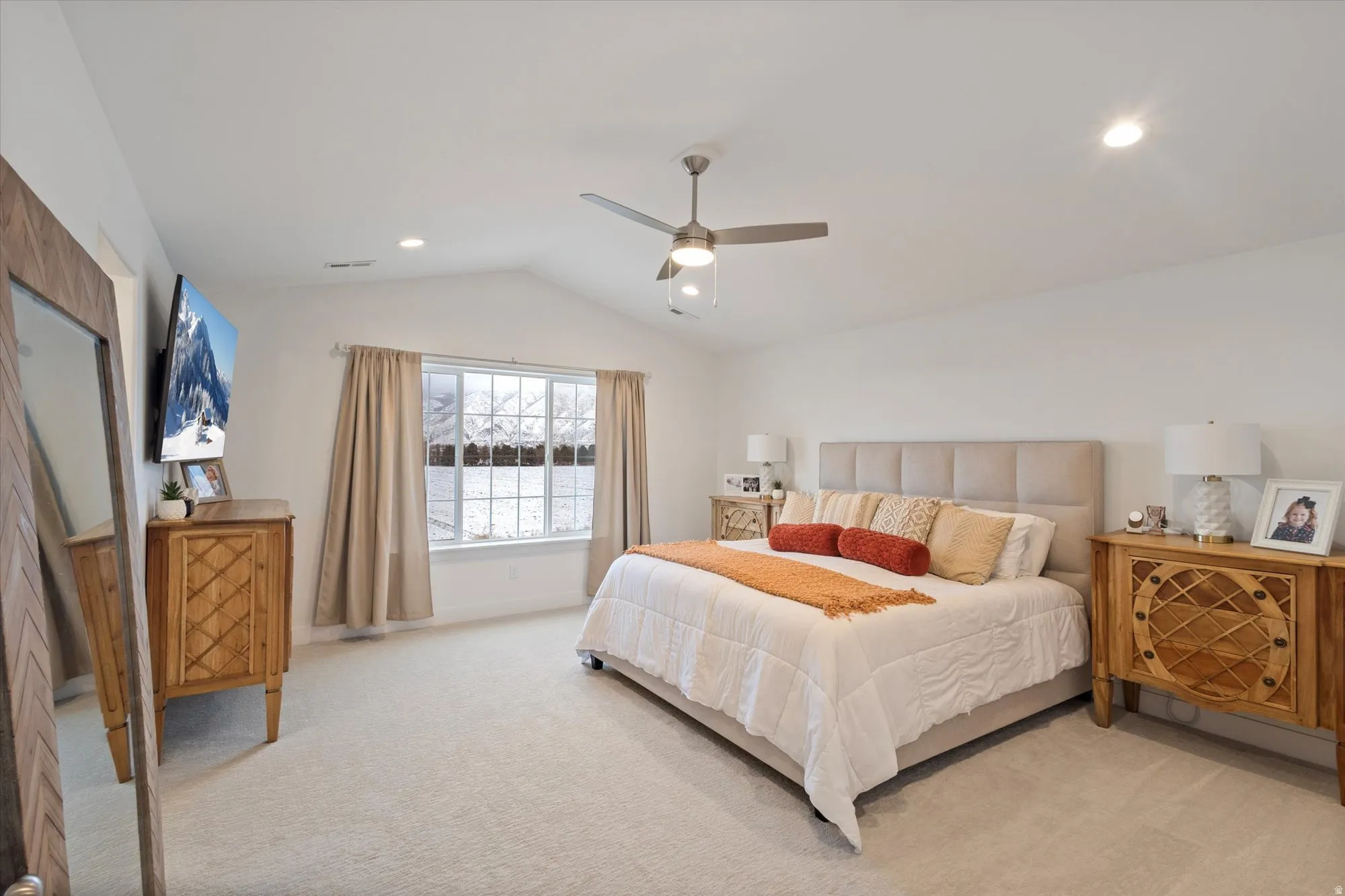 Bedroom featuring recessed lighting, a ceiling fan, vaulted ceiling, and light carpet