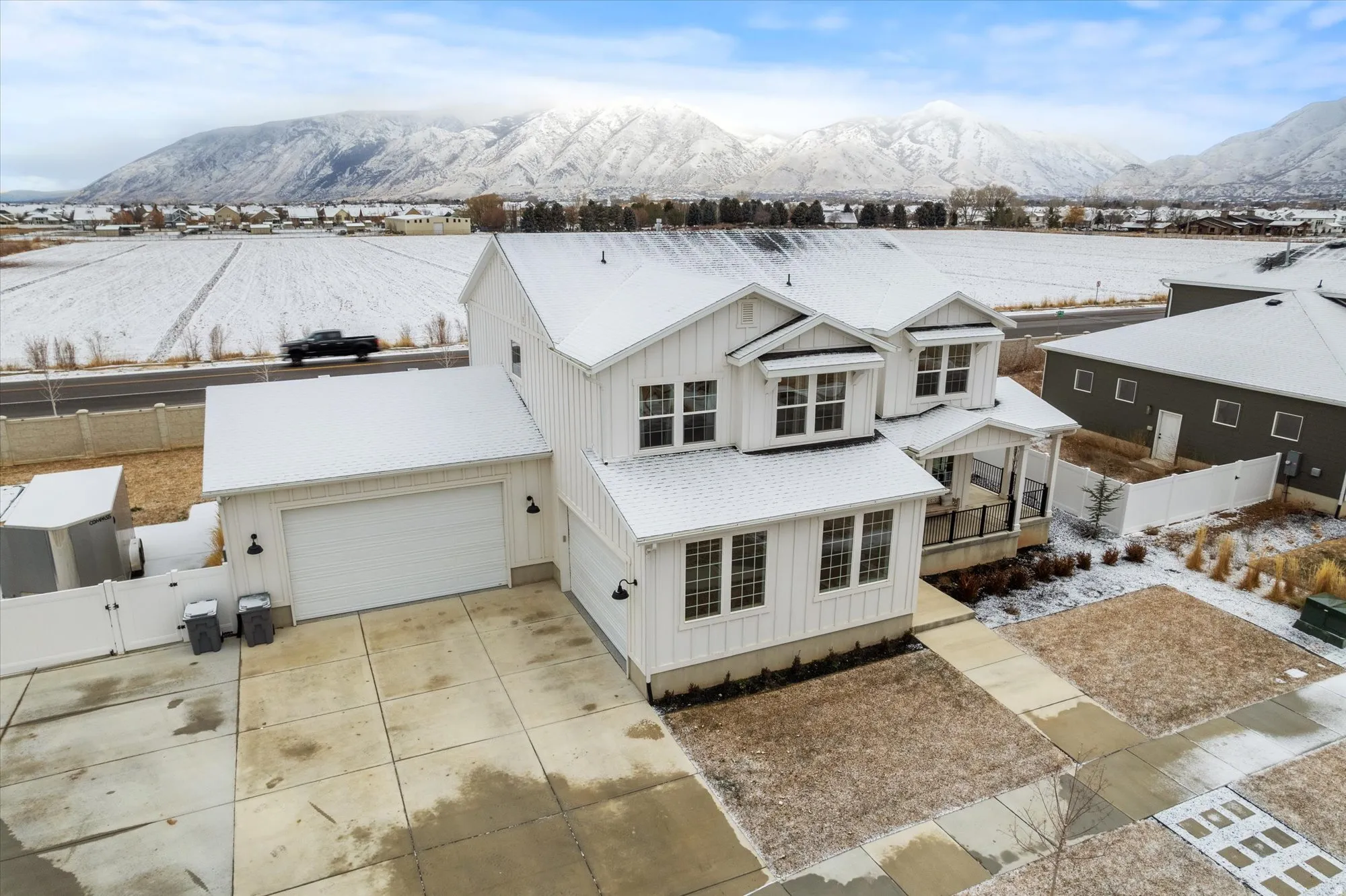 Snowy aerial view with a mountain view