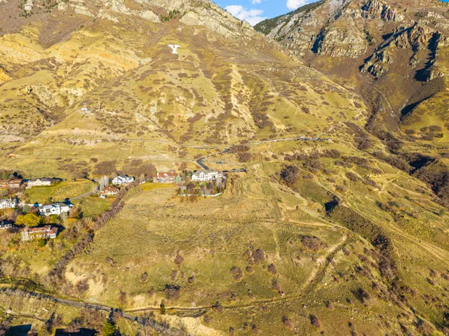 Overview of rural landscape featuring a mountain backdrop