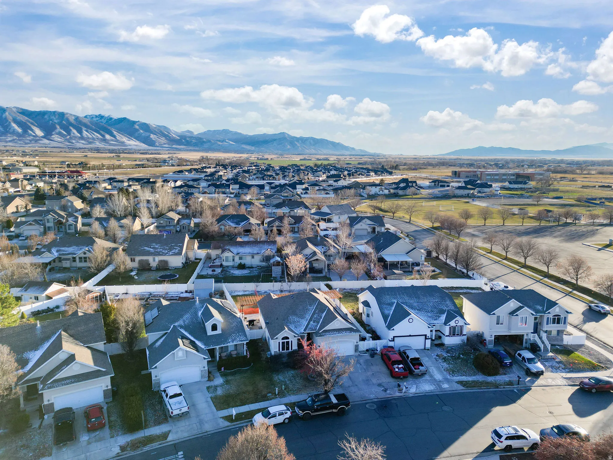 Aerial perspective of suburban area with mountains