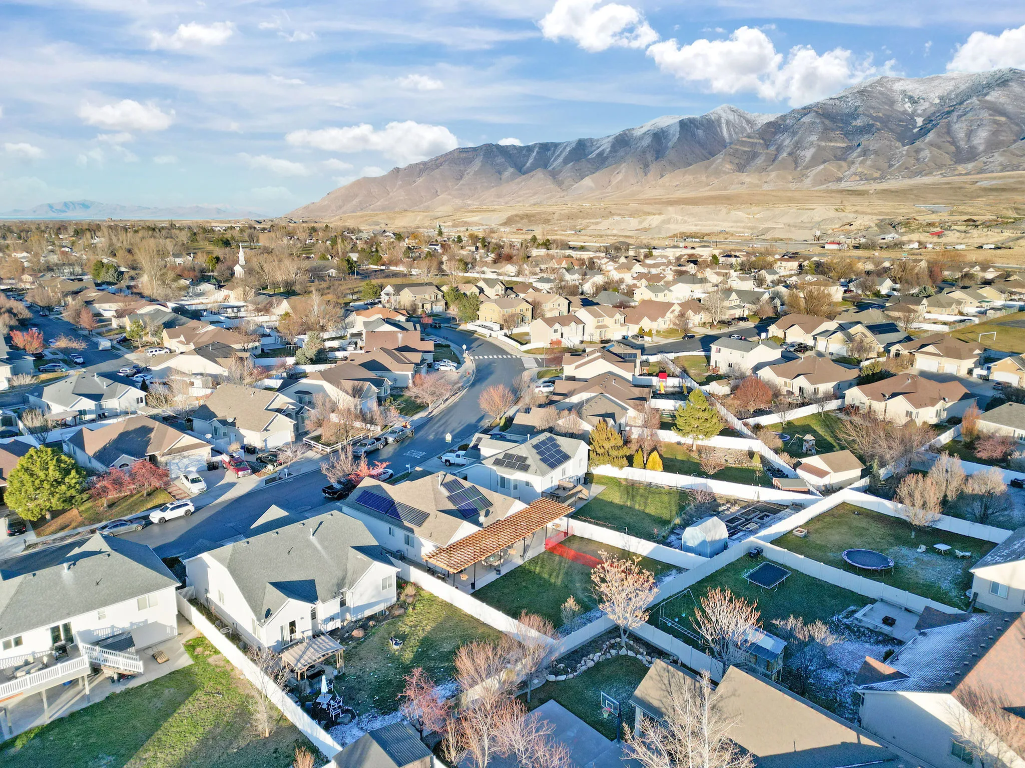 Aerial perspective of suburban area featuring mountains