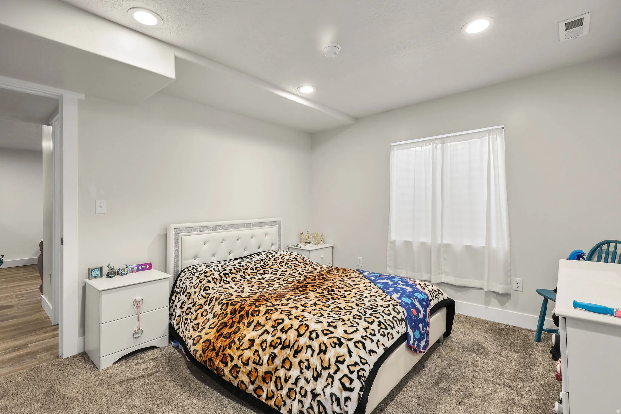 Bedroom featuring carpet floors and recessed lighting