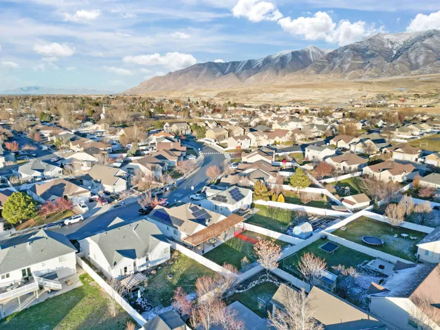 Aerial perspective of suburban area featuring mountains