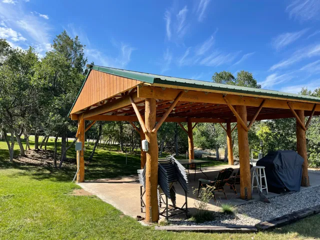 Surrounding community featuring a patio area and a lawn