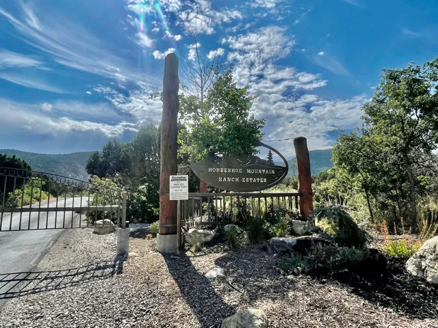 Community sign with a gate