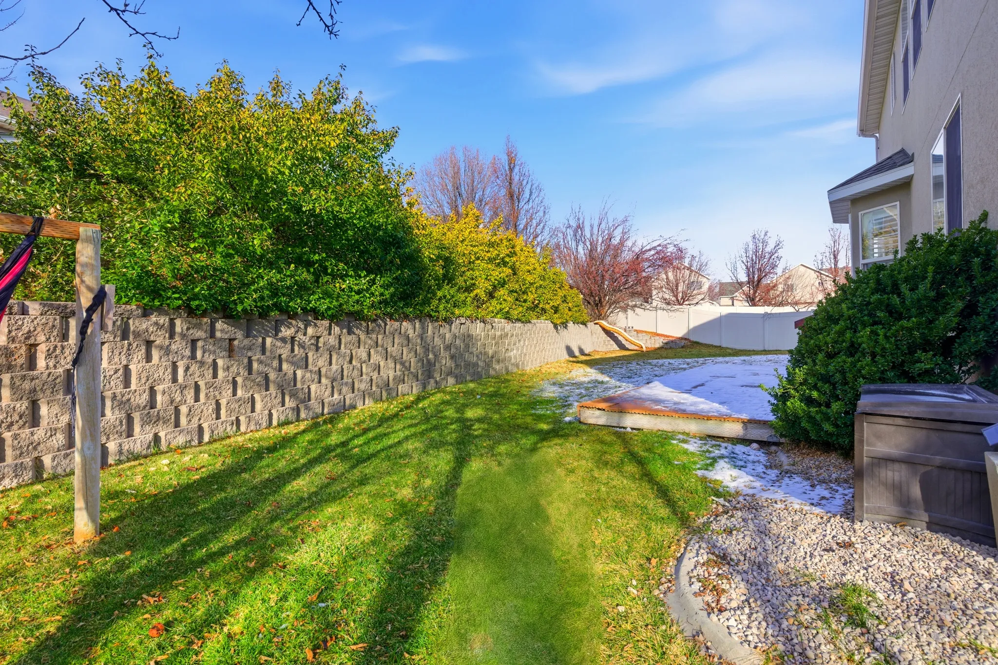 View of fenced backyard