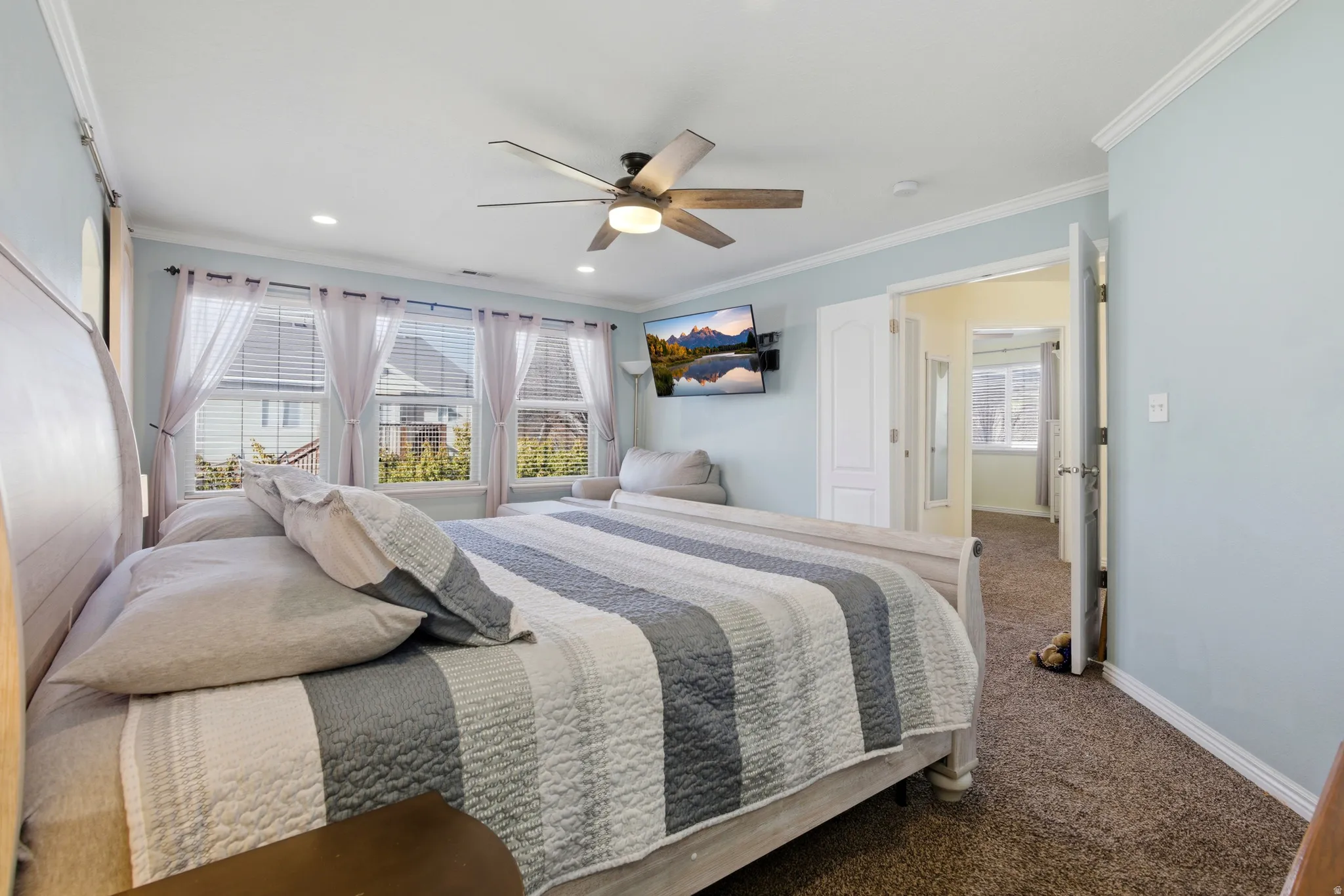 Bedroom featuring ornamental molding, carpet, a ceiling fan, and recessed lighting