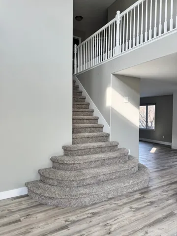 Staircase leading to the upstairs or second floor.