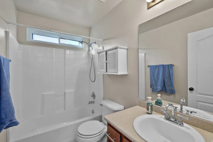 Upstairs Full bath with vanity and shower / bath combination