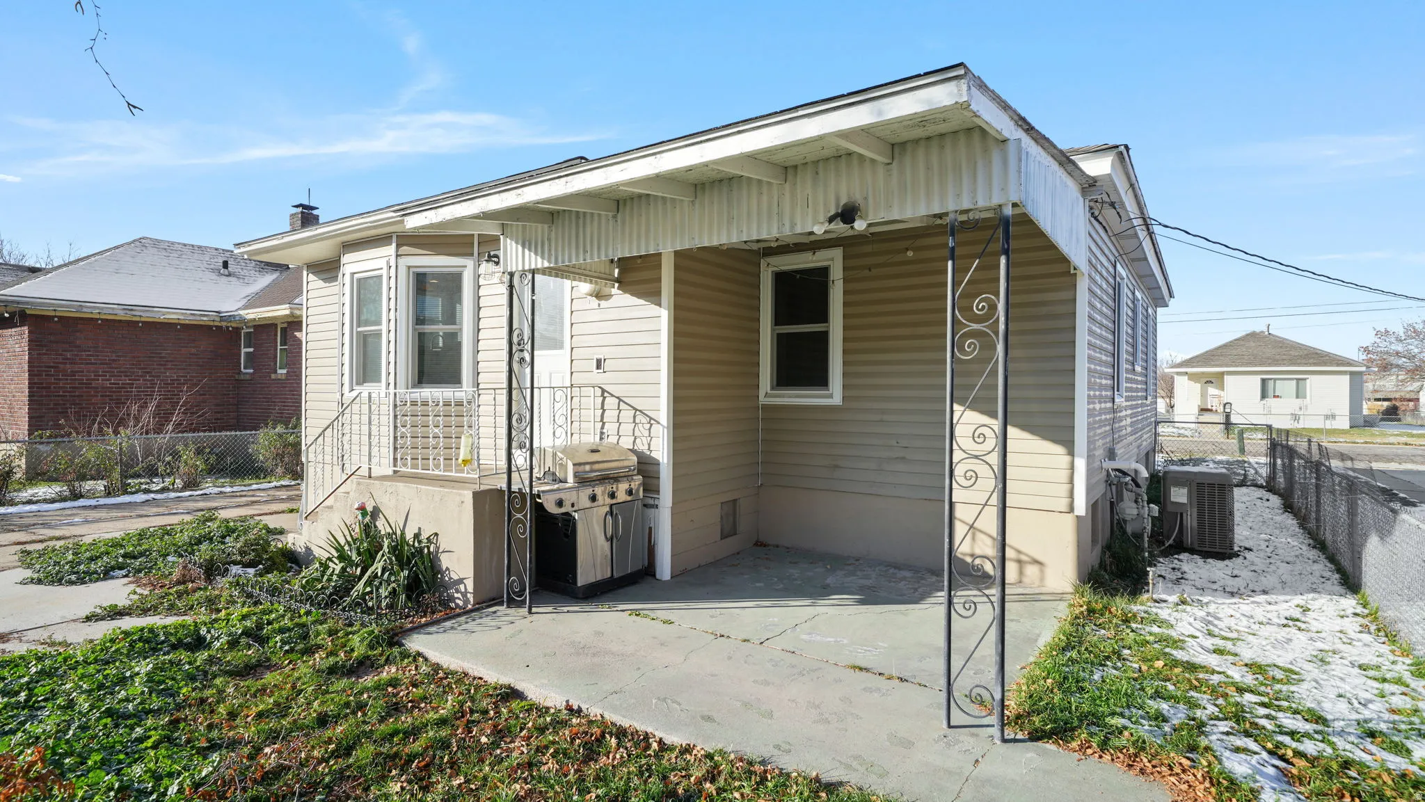 Rear view of property with a patio