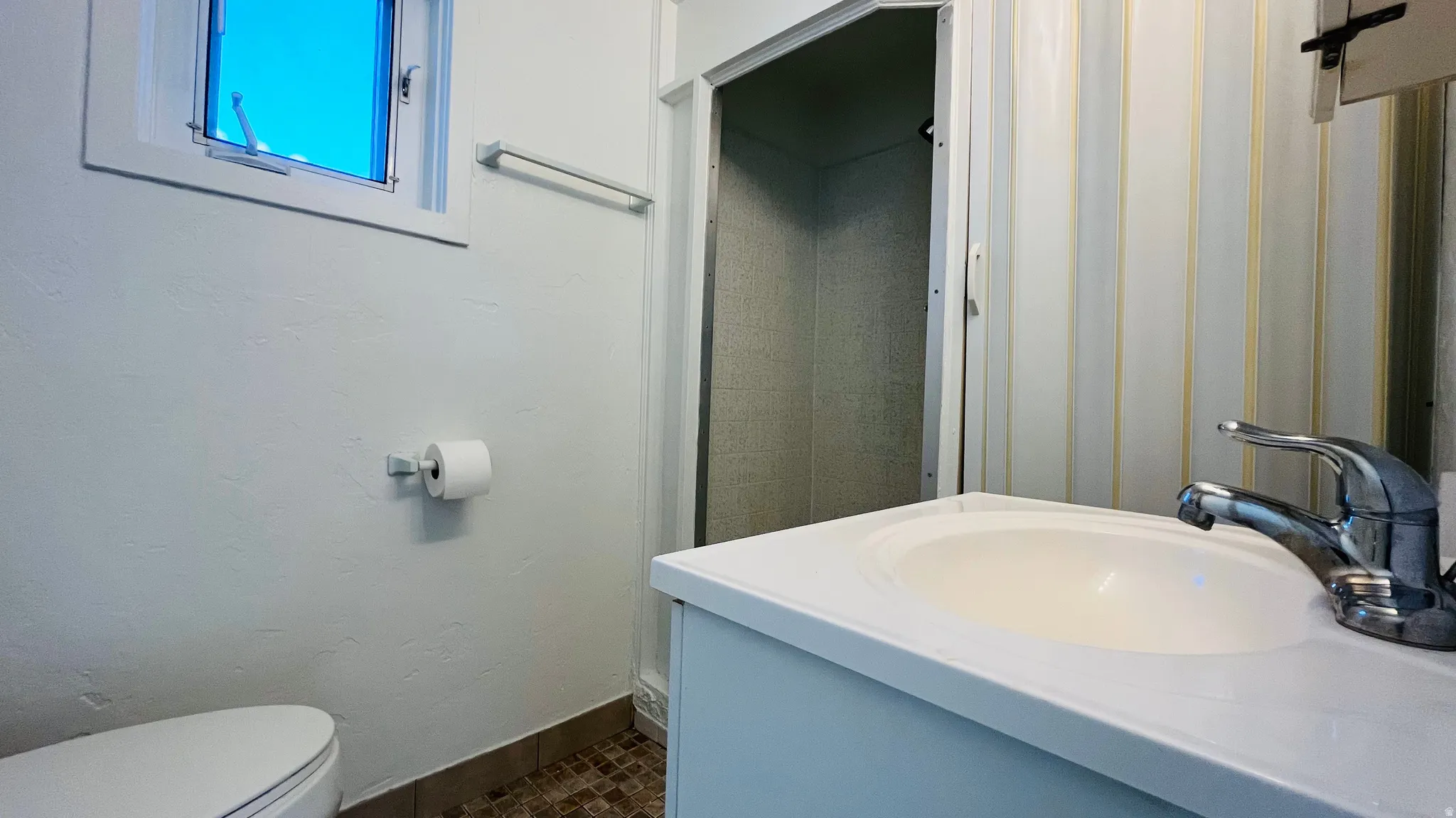 Full bath featuring vanity and a stall shower
