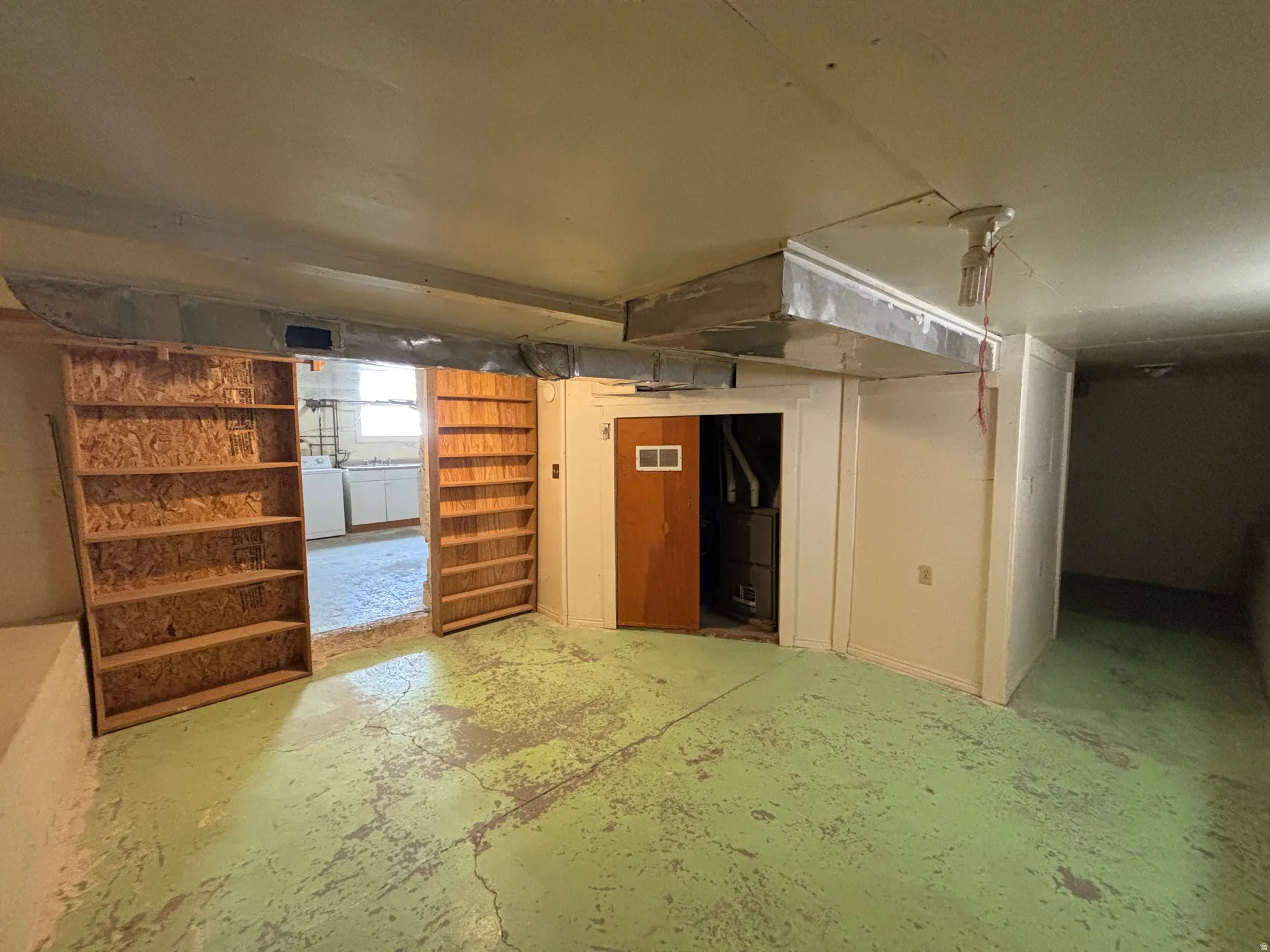 Basement featuring washing machine and dryer
