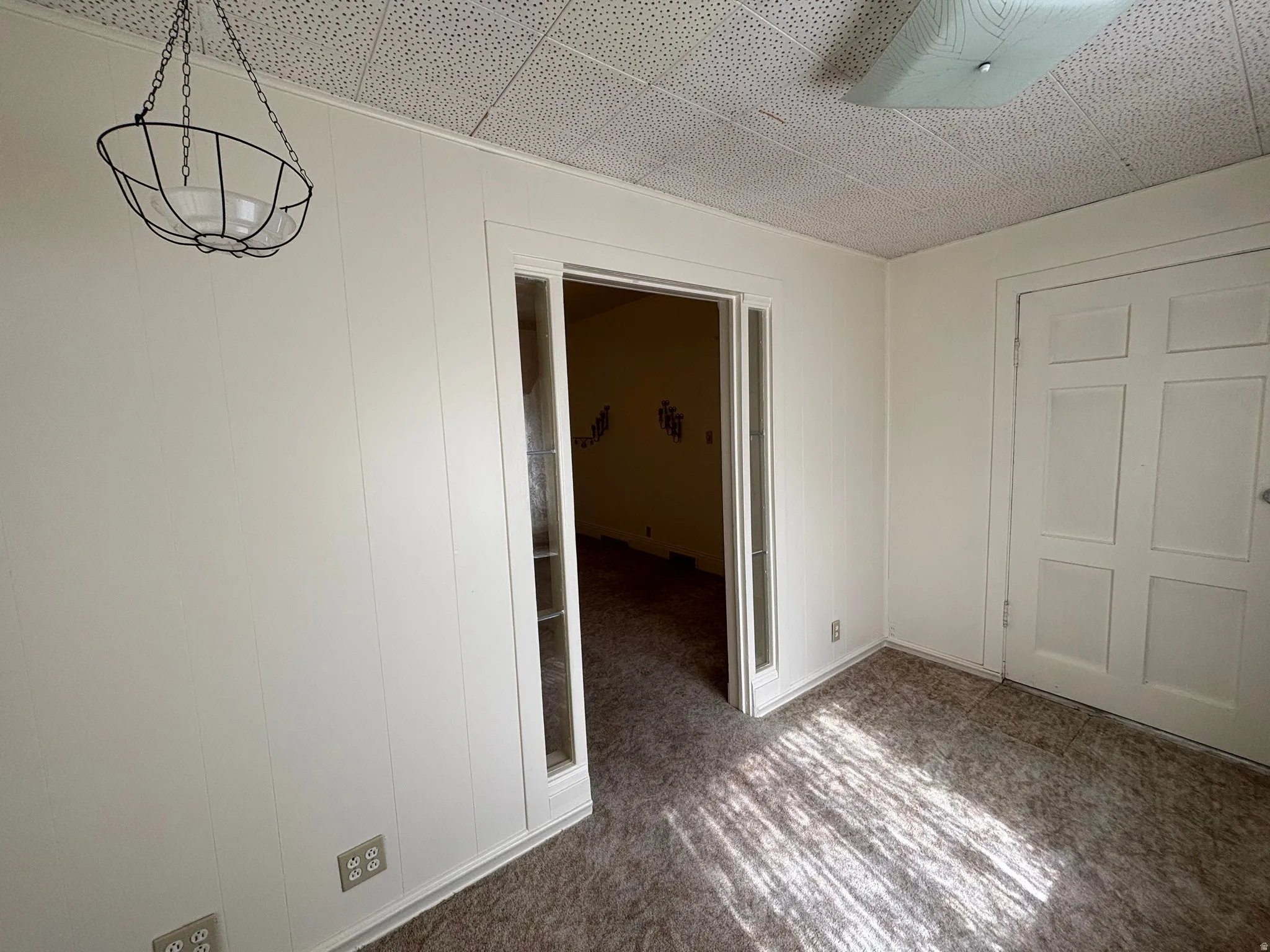 Unfurnished bedroom with carpet flooring