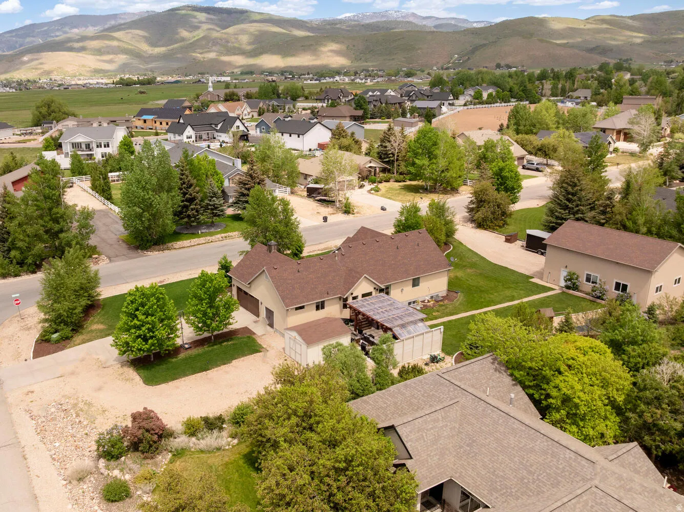 Aerial view of residential area with a mountainous background