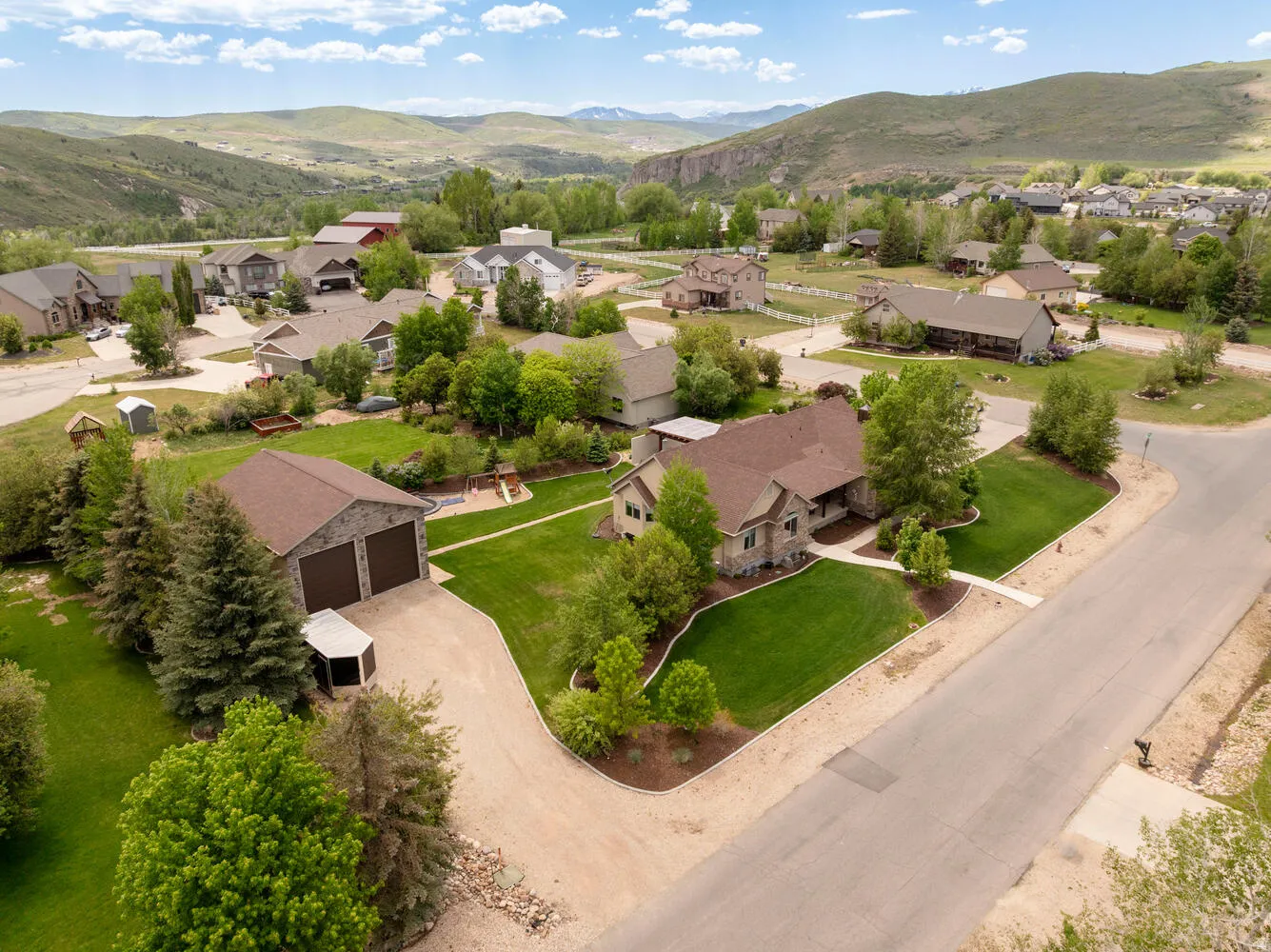 Aerial view of residential area with a mountainous background