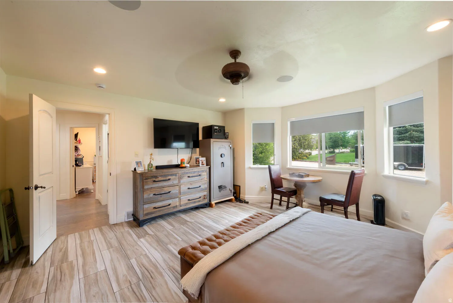 Bedroom featuring recessed lighting, a ceiling fan, and wood finish floors