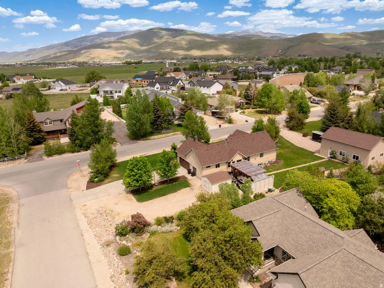 Aerial perspective of suburban area featuring mountains