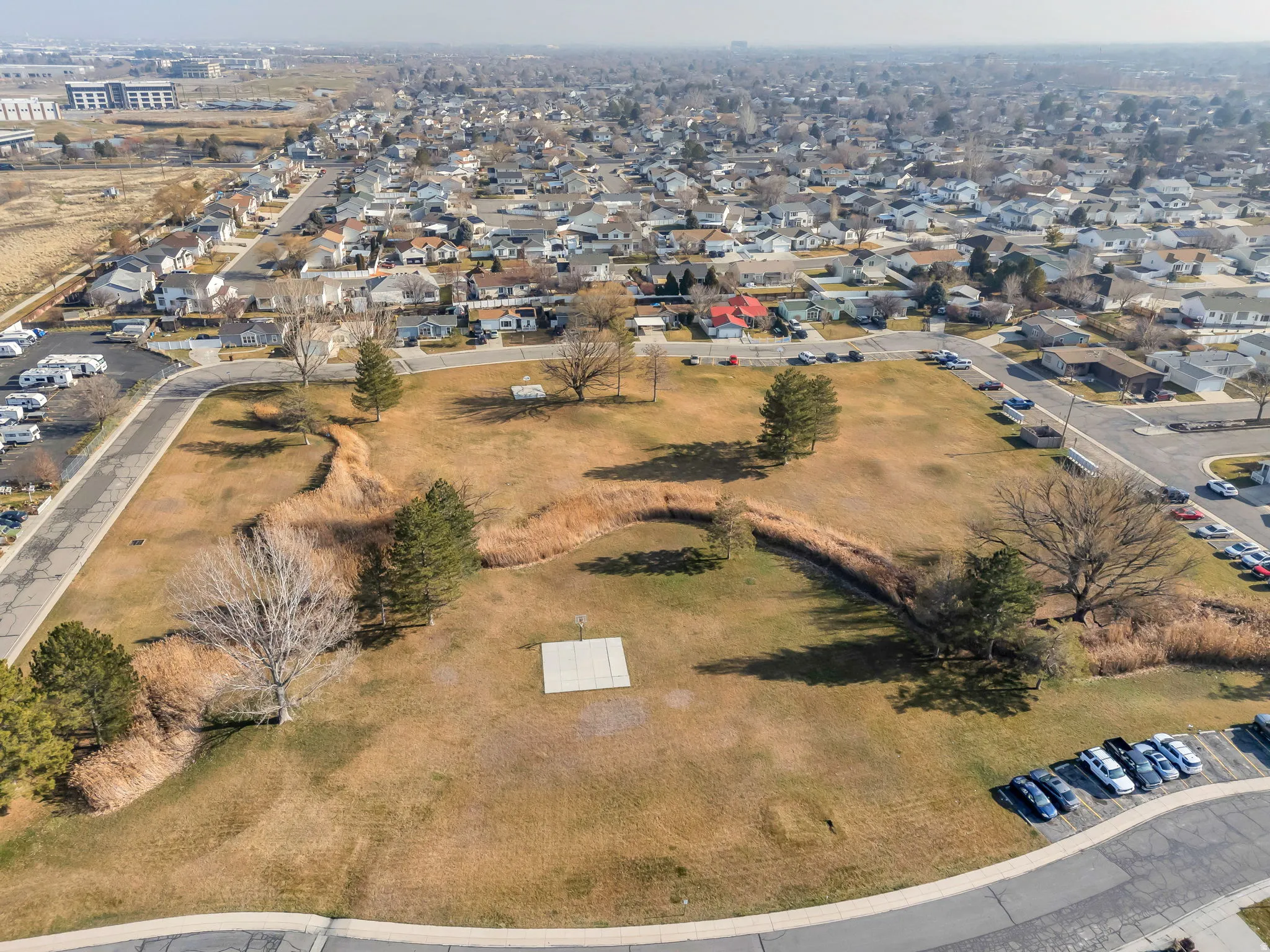 Aerial overview of property's location featuring nearby suburban area