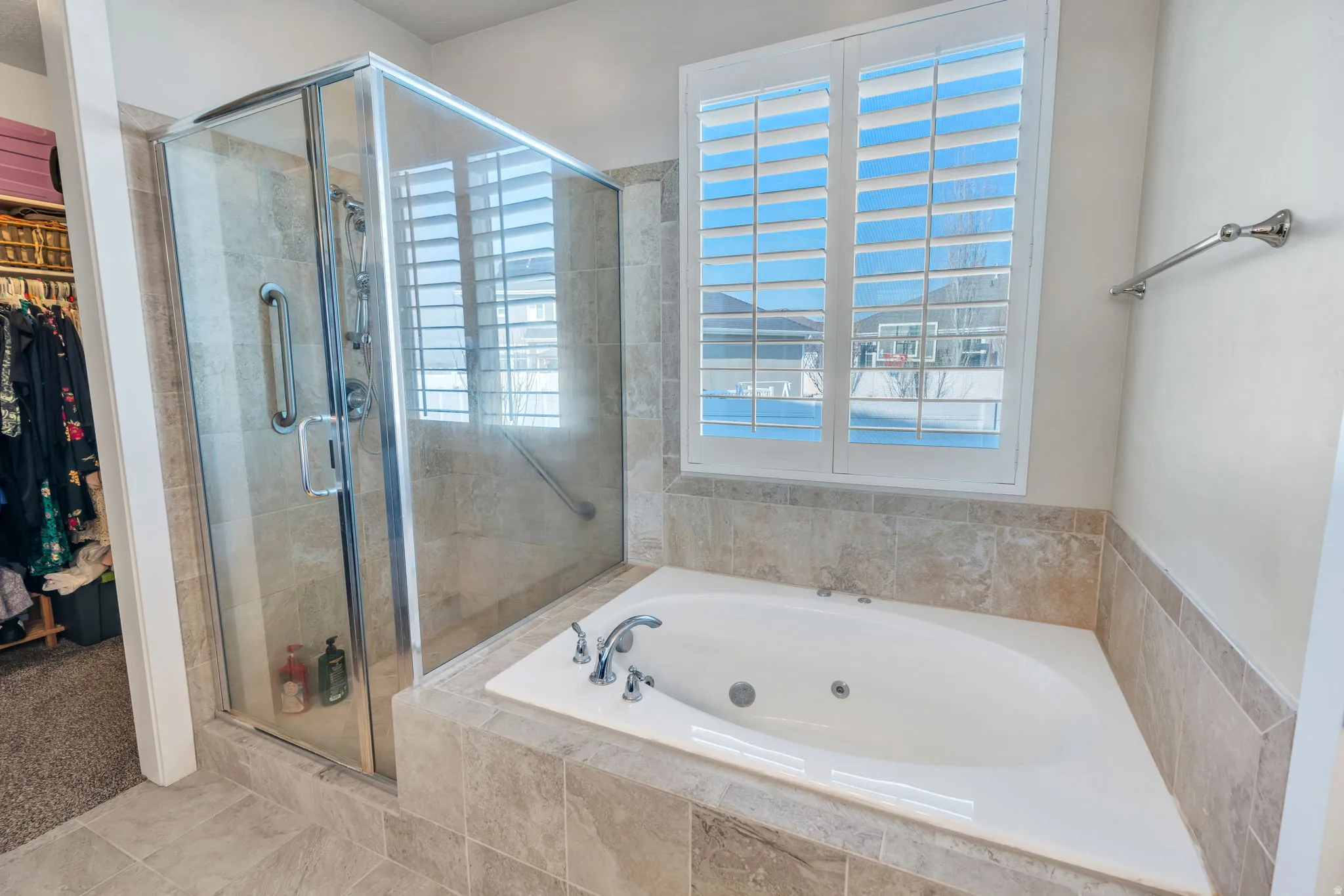 Beautiful master bath with separate tub and walk-in shower