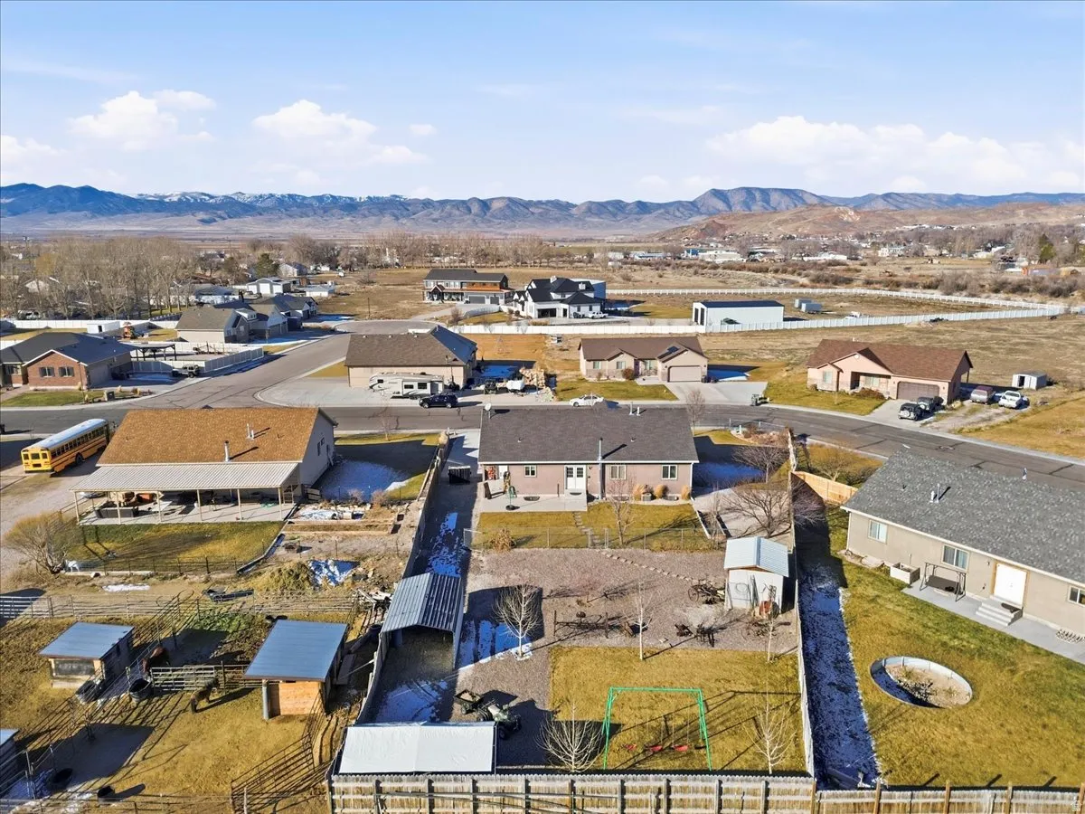 Aerial perspective of suburban area featuring mountains