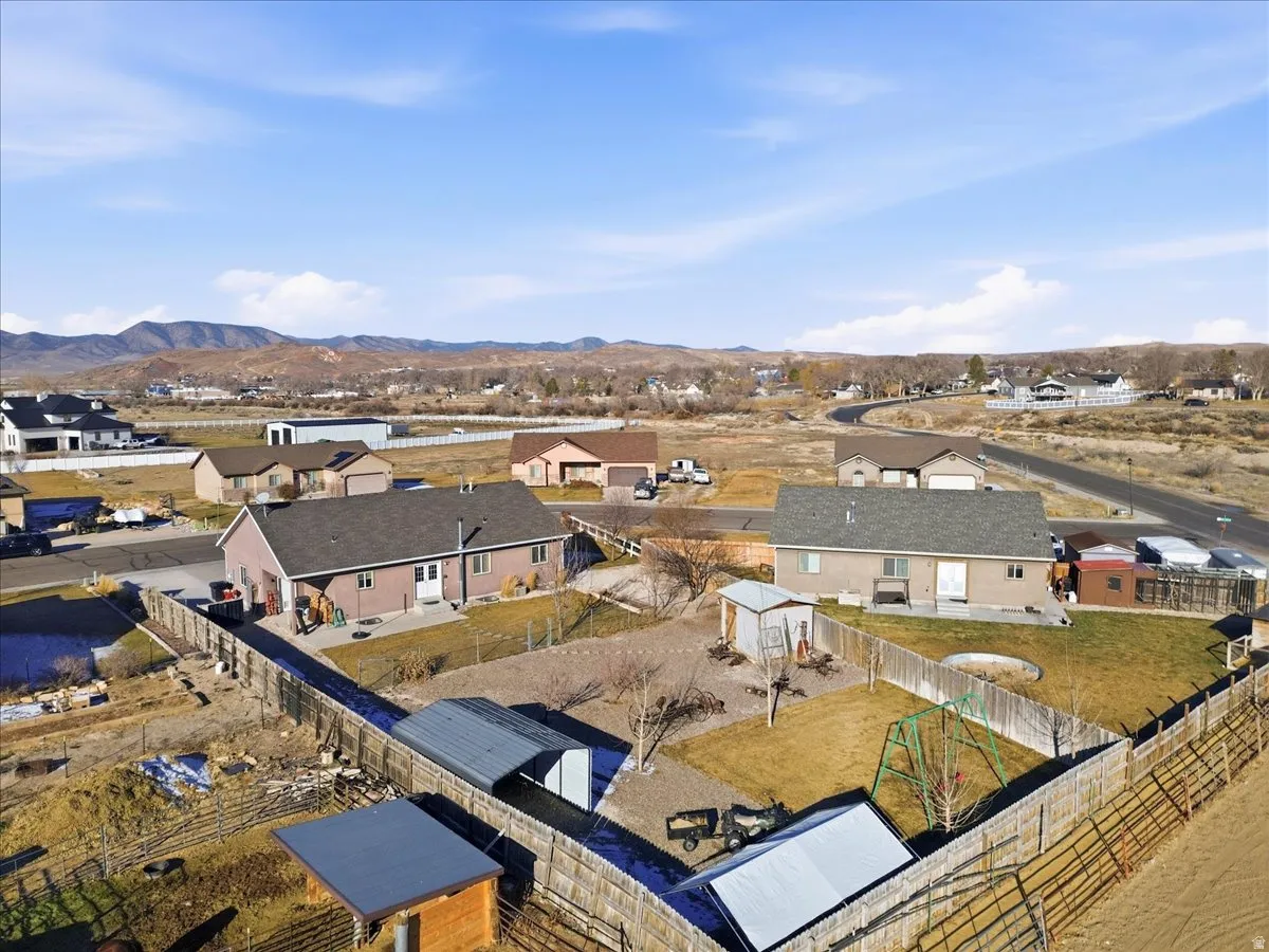 Aerial perspective of suburban area featuring mountains