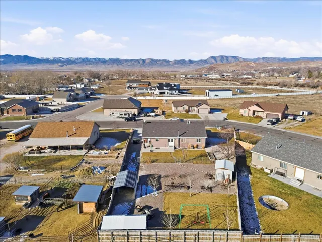 Aerial perspective of suburban area featuring mountains
