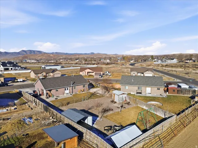 Aerial perspective of suburban area featuring mountains