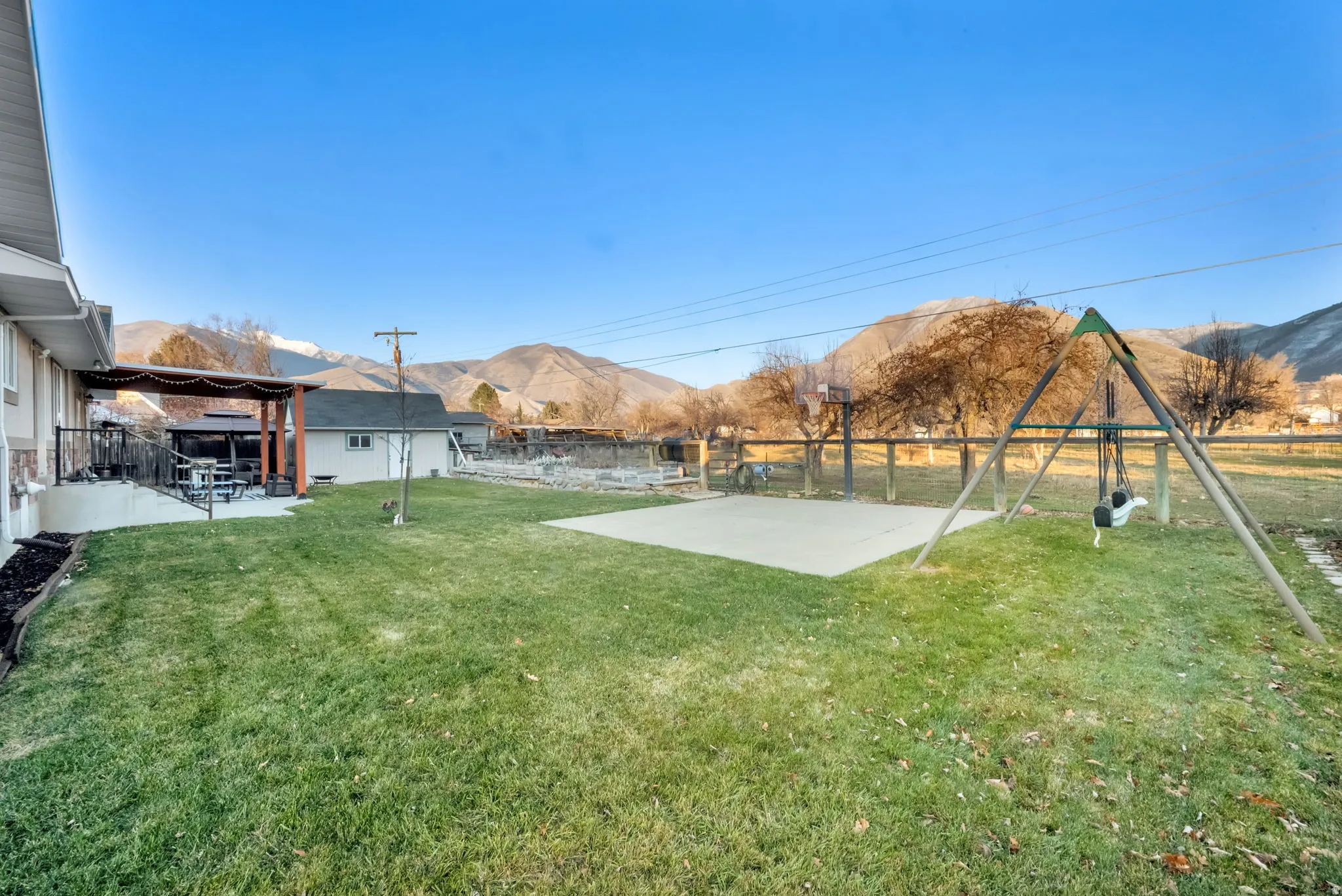 View of yard featuring a patio and a mountain view