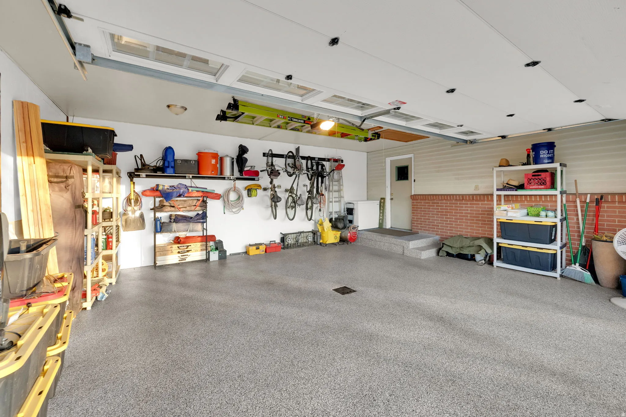 Garage with white refrigerator