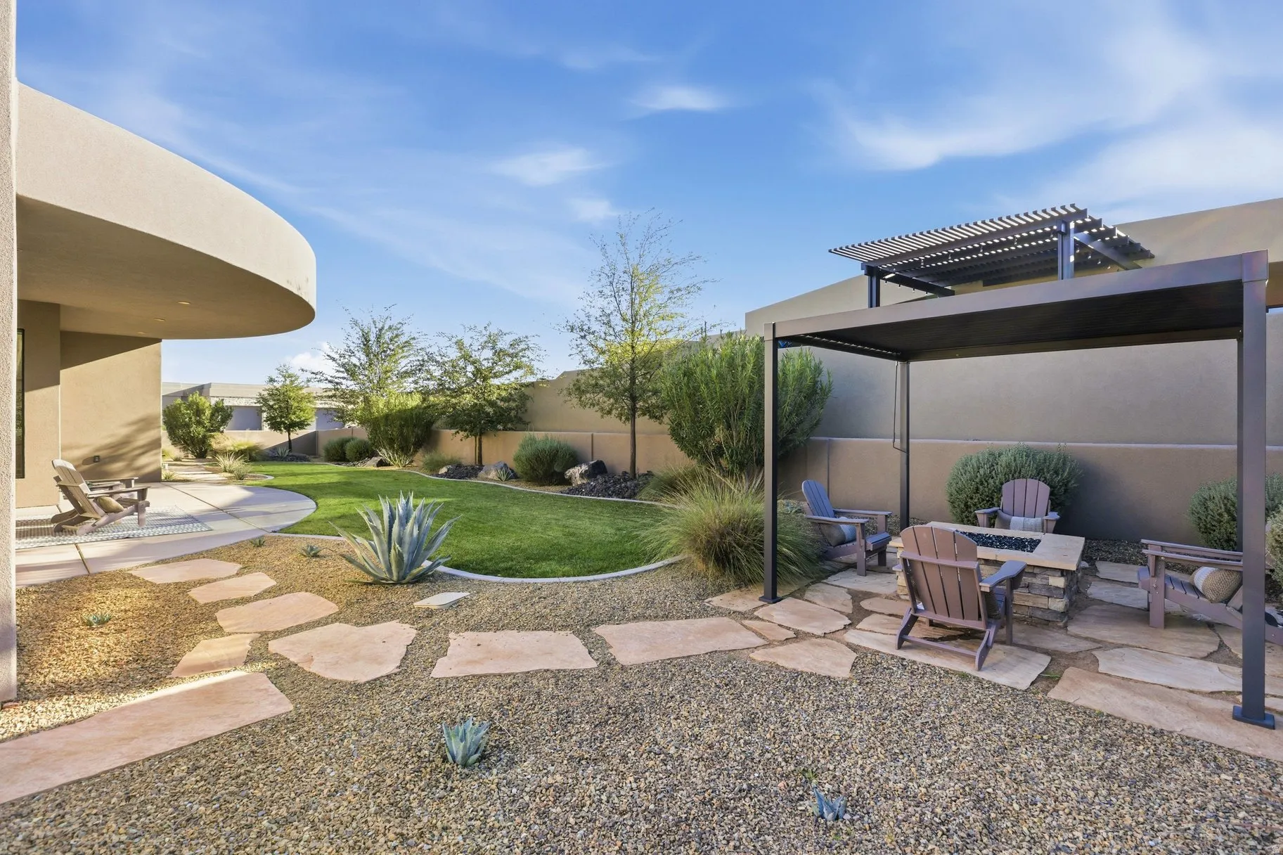View of yard featuring a patio, a fire pit, and a pergola