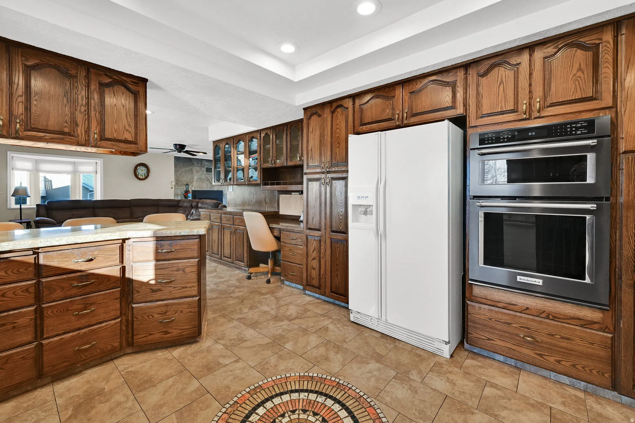 Kitchen featuring built in study custom cabinetry