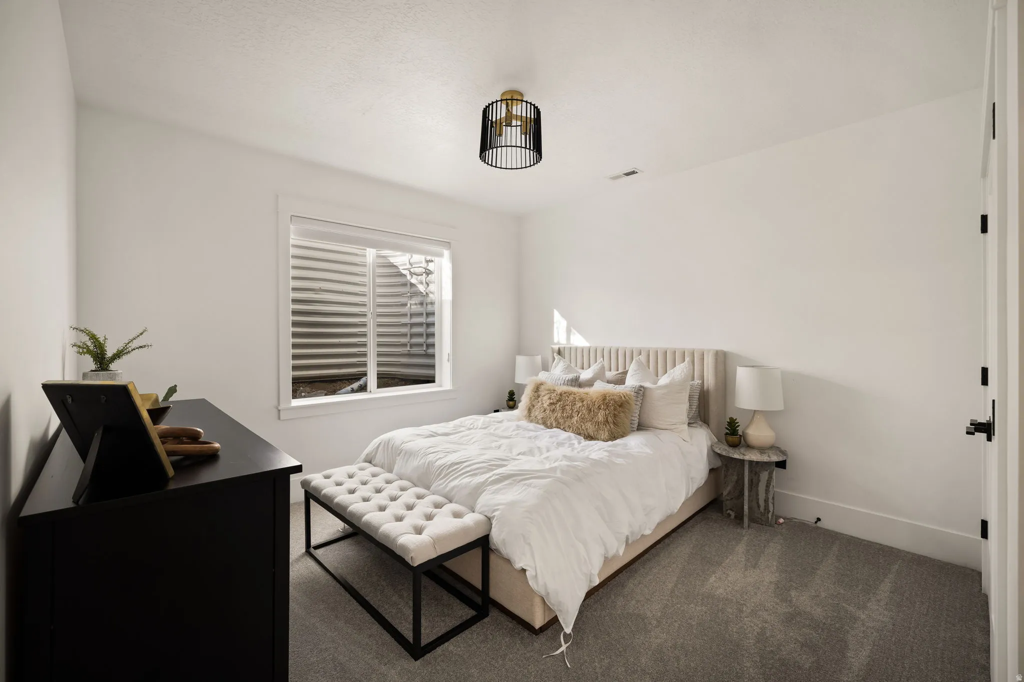 Bedroom with carpet and baseboards