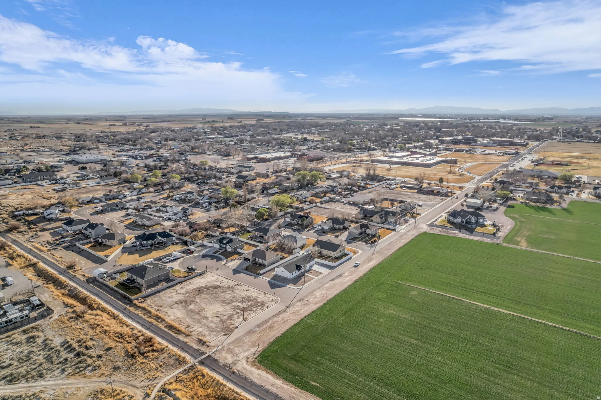 Aerial perspective of suburban area featuring mountains