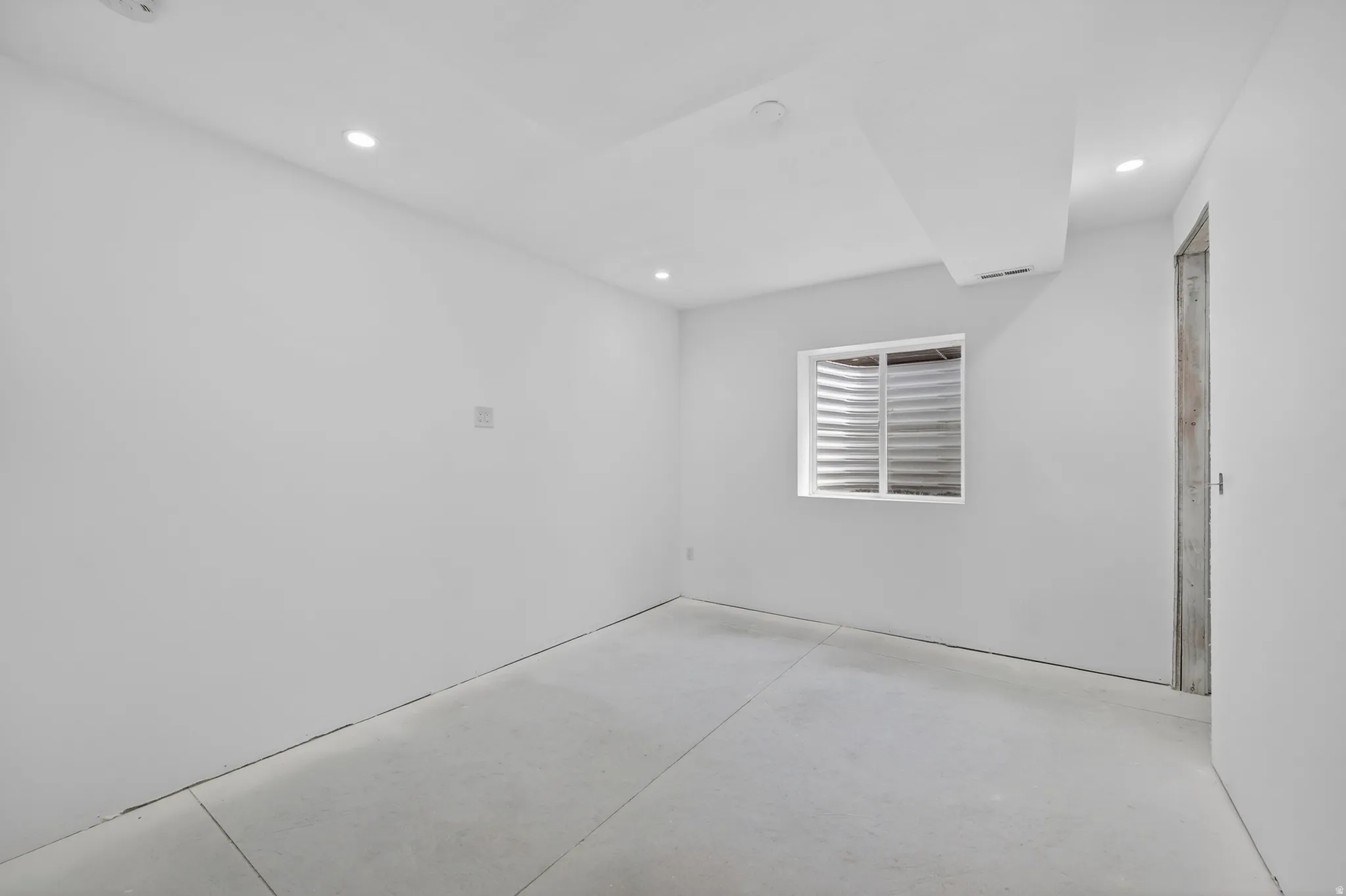 Basement bedroom 1 awaiting your finishing  touch