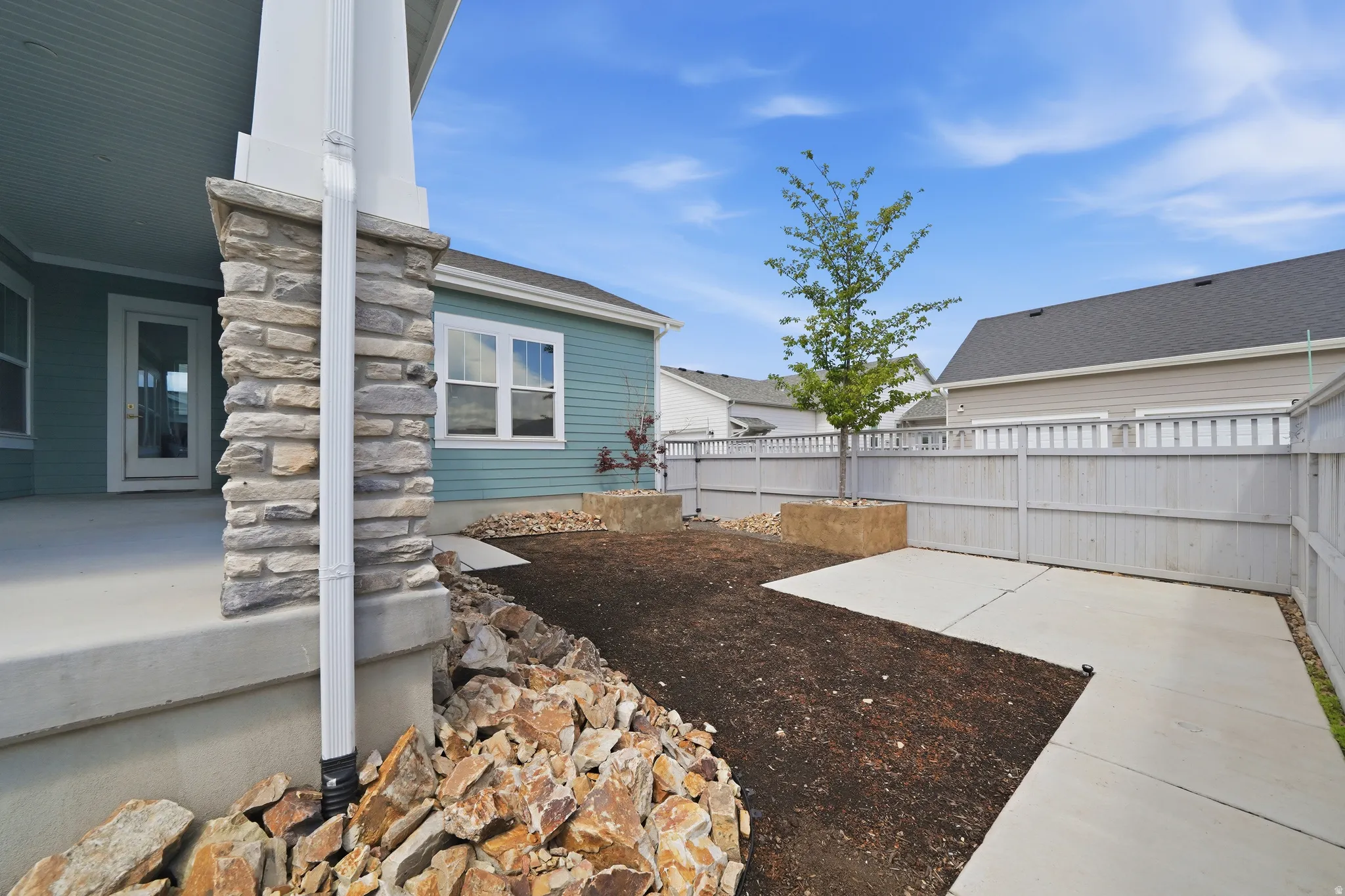 Backyard with a cement patio