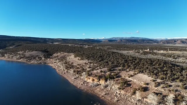 Drone / aerial view of a water and mountain view