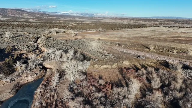 View of property location with rural landscape and mountains