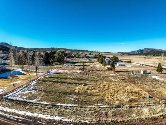 View of rural area featuring a mountainous background and property boundaries highlighted