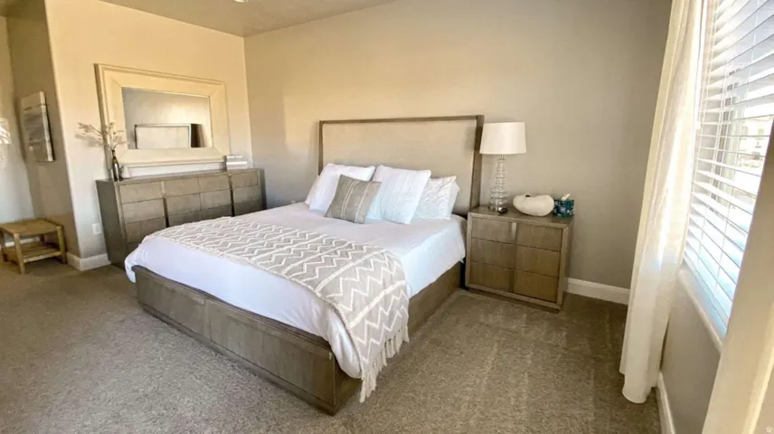 Bedroom featuring carpet flooring