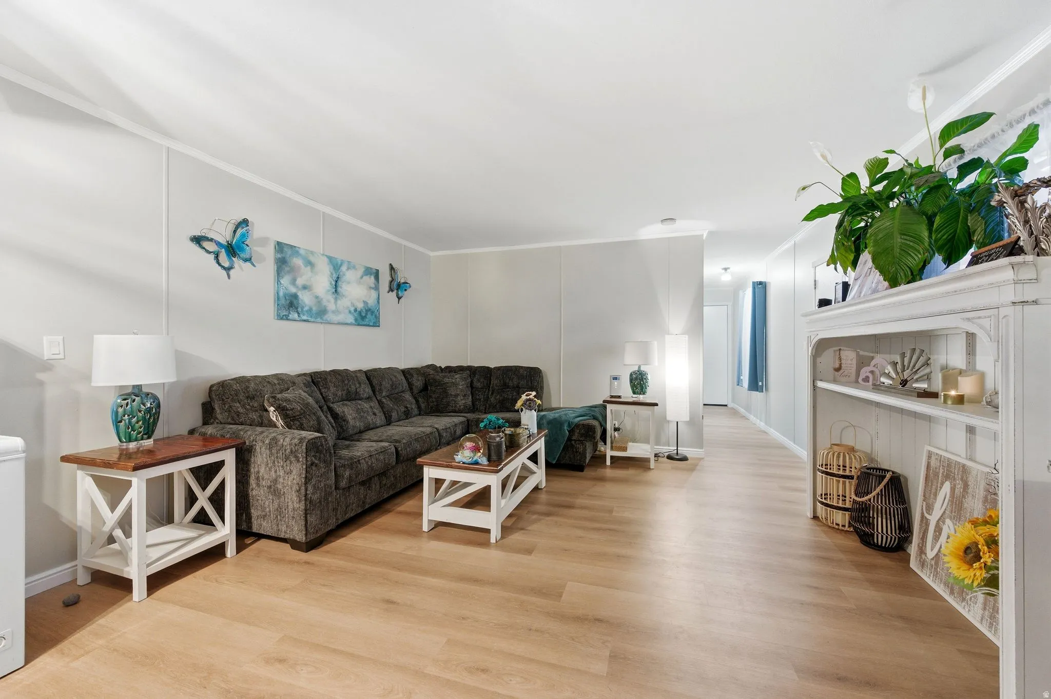 Living area with light wood finished floors