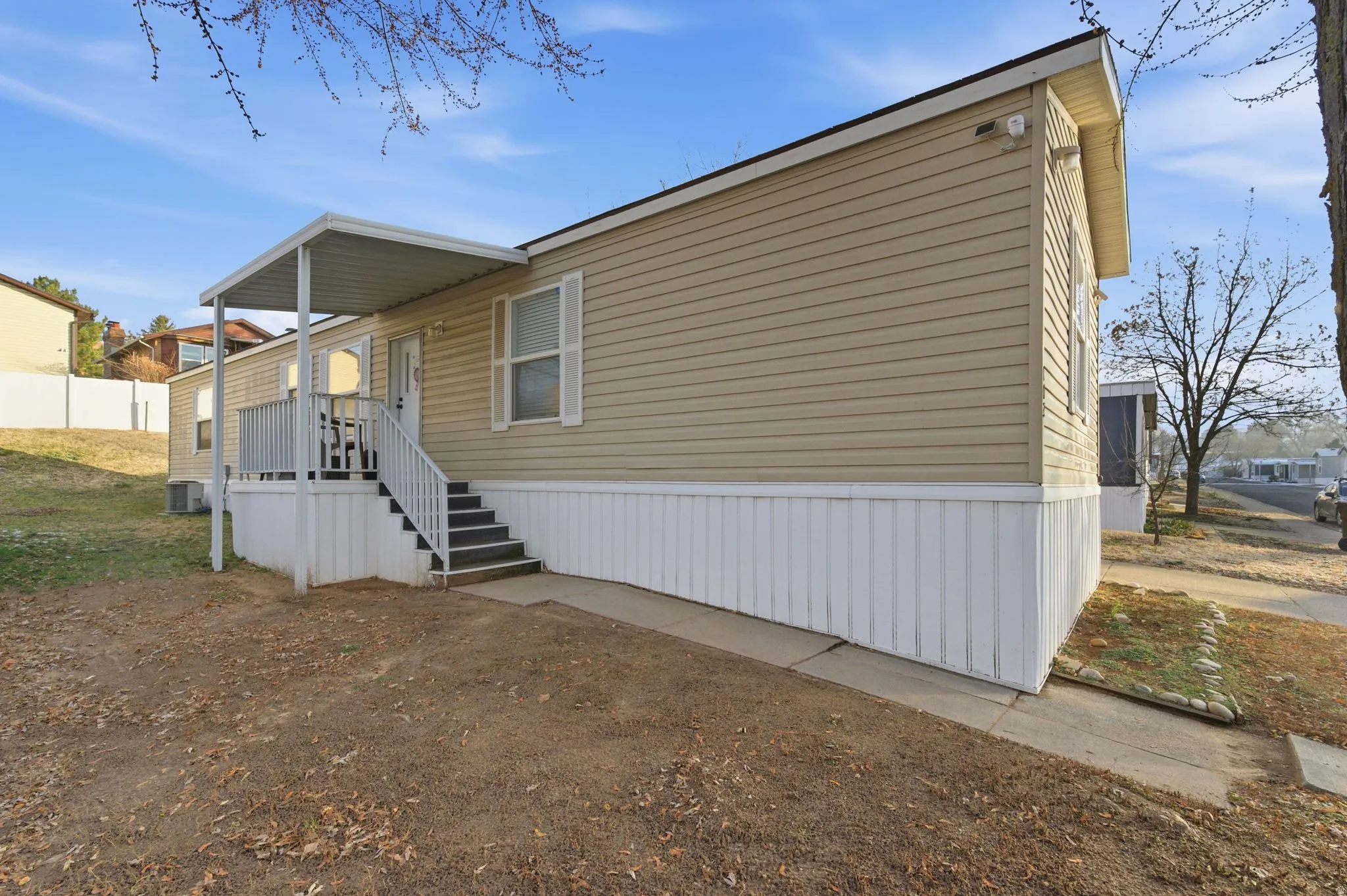 View of home's exterior with a central air condition unit