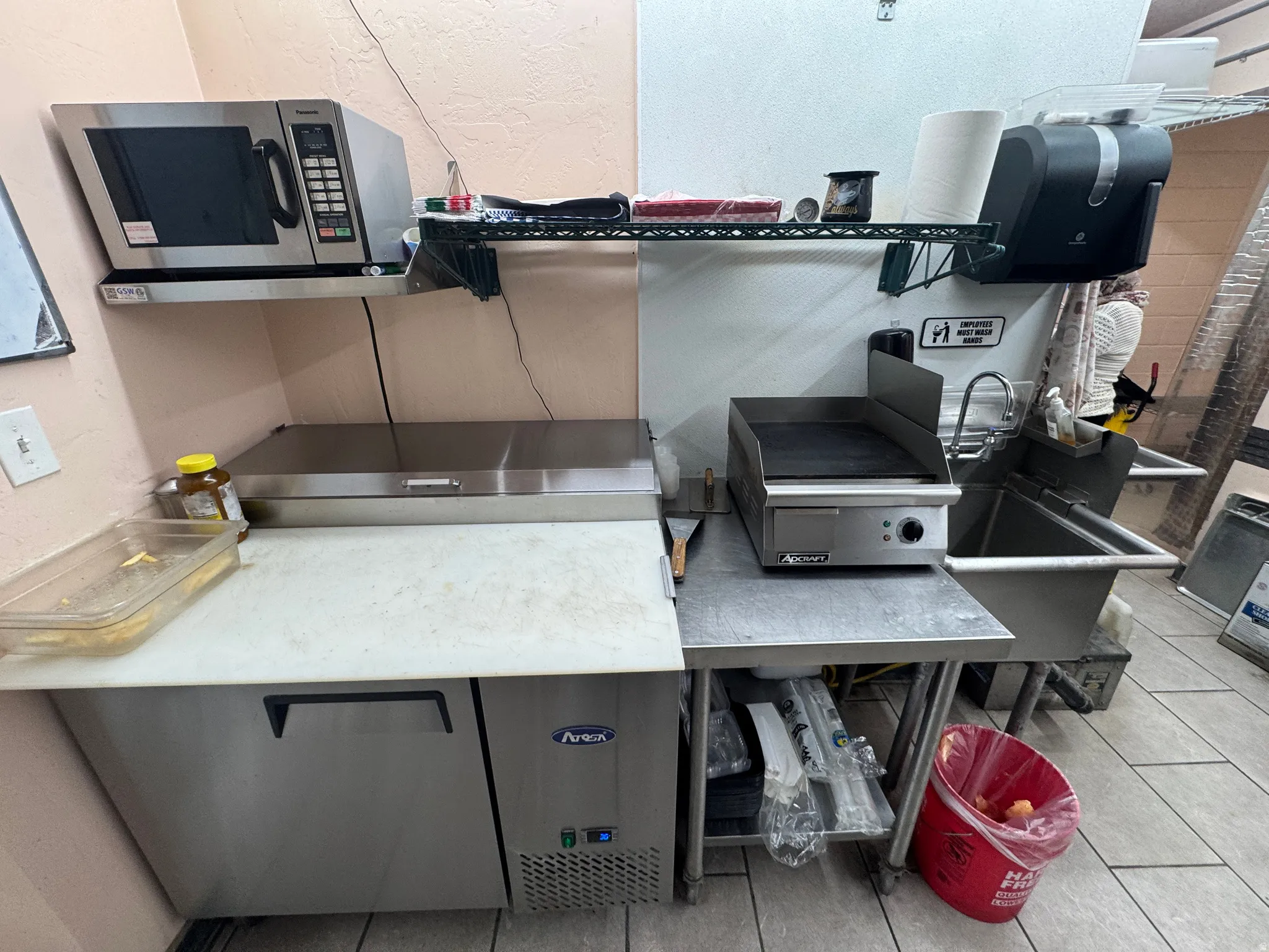 Kitchen with stainless steel microwave and dishwasher